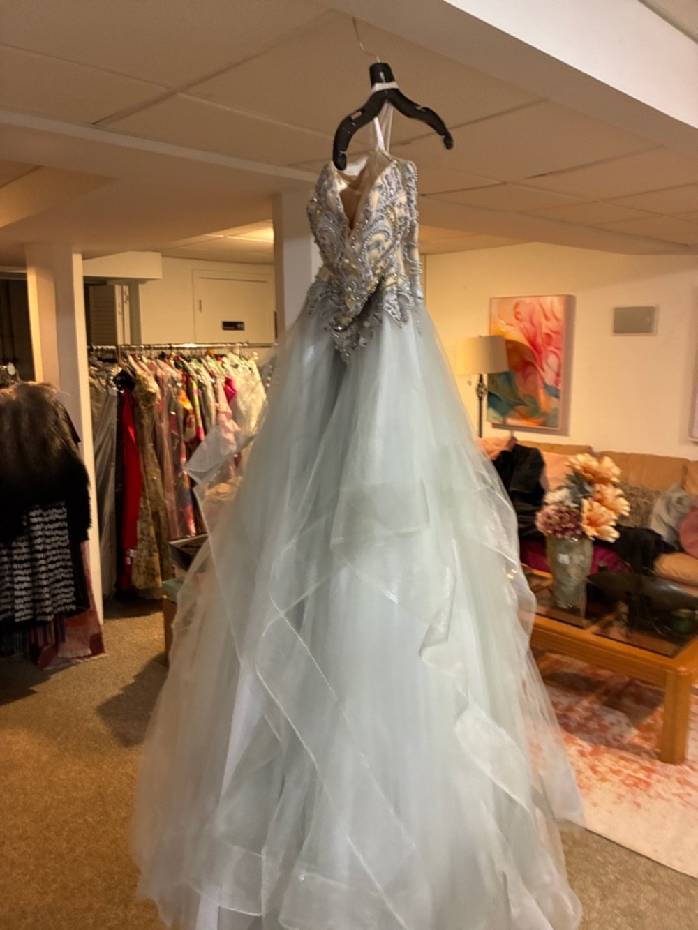 Terani Couture Light gray evening gown, not light blue.